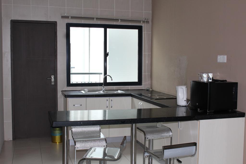 קוצ'ינג Tribeca Suites מראה חיצוני תמונה
