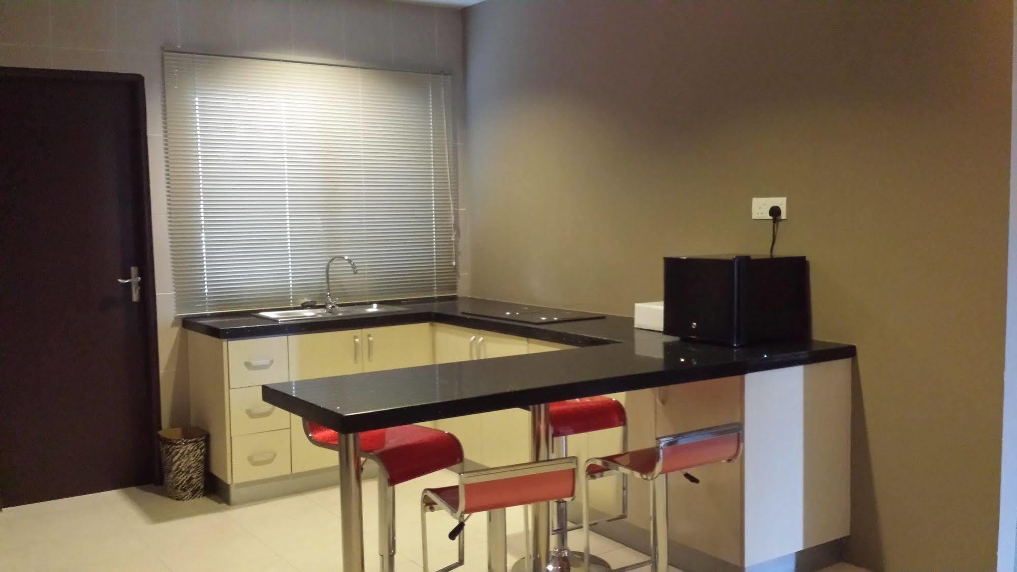 קוצ'ינג Tribeca Suites מראה חיצוני תמונה